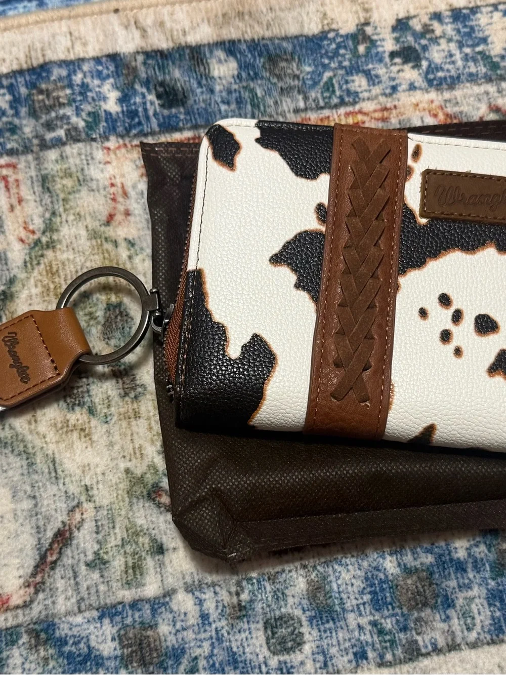 Wrangler Cow-Print Zip Wristlet Wallet in White, Black & Brown